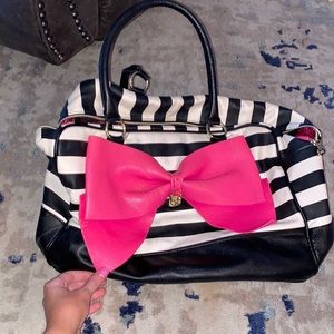 Betsy Johnson duffel bag with pink bow black and white striped.